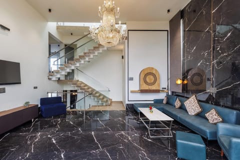 Villa (1 Bedroom) | Living area | 42-inch TV with digital channels