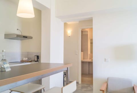 Apartment, Partial Sea View, Ground Floor | Private kitchenette | Fridge, electric kettle