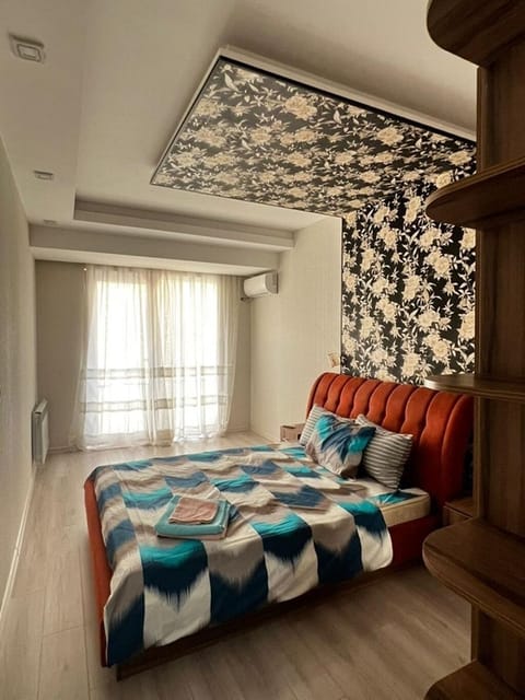 Family Apartment, Balcony, City View | In-room safe, desk, laptop workspace, blackout drapes