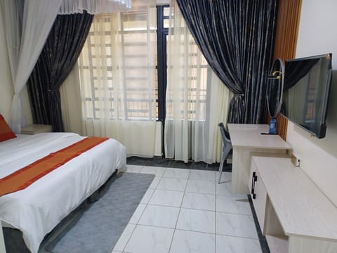 Deluxe Double Room, City View | Desk, laptop workspace, iron/ironing board, WiFi (free)