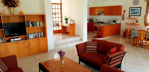 32-inch flat-screen TV with satellite channels, TV, DVD player