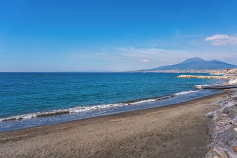 Apartment, Balcony, Partial Sea View | Beach