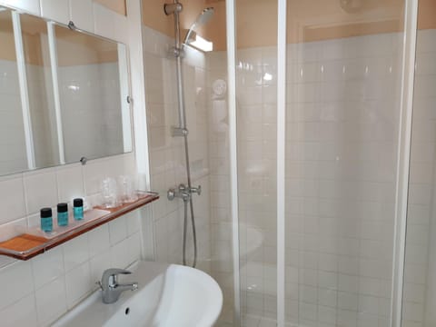 Shower, free toiletries, hair dryer, towels