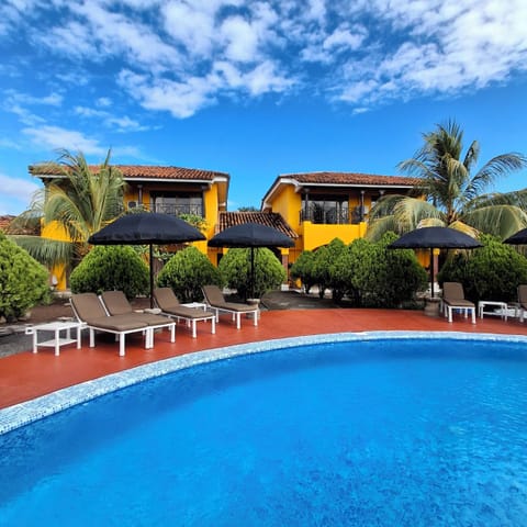 Outdoor pool, open 8:00 AM to 9:00 PM, pool umbrellas, sun loungers
