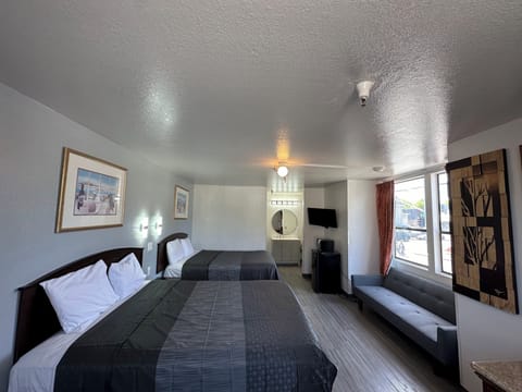 Room, 2 Queen Beds, Non Smoking | Free WiFi, bed sheets, wheelchair access