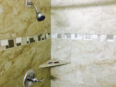 Rainfall showerhead, towels, soap, shampoo