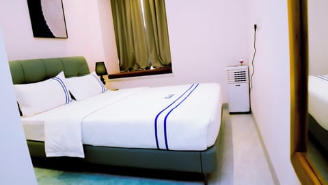 Comfort Apartment, Balcony, City View | Iron/ironing board, WiFi (free), bed sheets