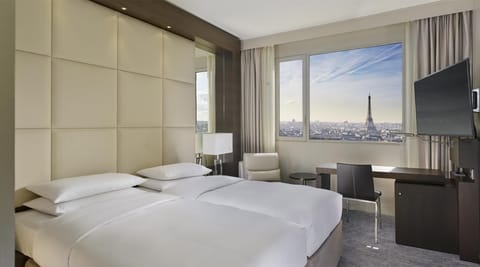 2 twin beds with Eiffel Tower View | Premium bedding, in-room safe, desk, blackout drapes