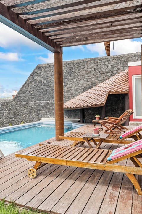 Outdoor pool, pool umbrellas, sun loungers