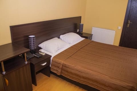 Basic Double Room, Balcony, City View | Desk, laptop workspace, iron/ironing board (on request), WiFi (free)