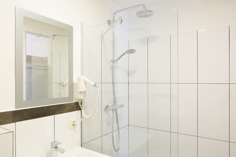 Hair dryer, towels, soap, shampoo