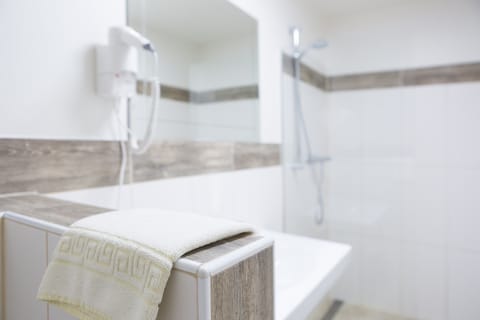 Hair dryer, towels, soap, shampoo