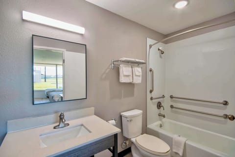 Combined shower/tub, hair dryer, towels, soap