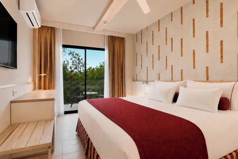 Double Room, Pool View | Minibar, in-room safe, desk, blackout drapes