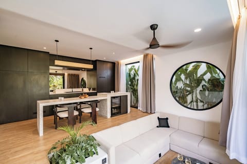 Deluxe Villa, 2 Bedrooms, Patio, Pool View | Living room | 65-inch TV with cable channels