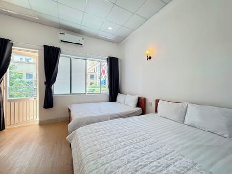 Superior Quadruple Room, City View | Desk, WiFi (free), individually decorated, bed sheets