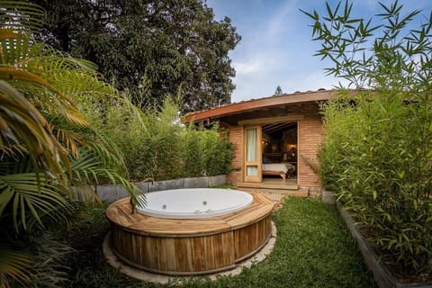 Suite, Hot Tub, Garden View | Outdoor spa tub