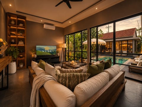 Signature Villa, Patio, Courtyard View | Living area | 42-inch Smart TV with digital channels