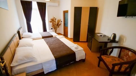 Standard Triple Room, Balcony, Lagoon View | Desk, WiFi (free)
