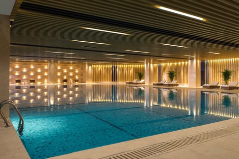 Indoor pool, open 9:00 AM to 9:00 PM, sun loungers, lifeguards on site