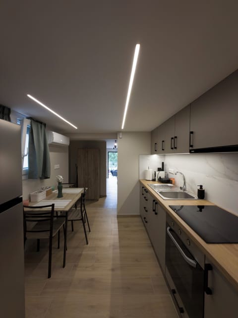 Deluxe Double Room, Courtyard View | Private kitchen | Espresso maker, coffee/tea maker, fridge, toaster