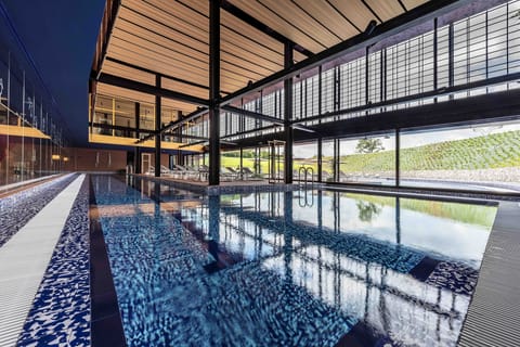 Indoor pool, seasonal outdoor pool, sun loungers