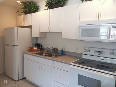 Townhome, 1 King Bed (Room 38) | Private kitchen | Fridge, microwave, coffee/tea maker, freezer