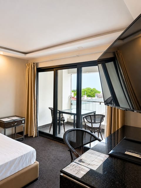 Suite, 1 King Bed, Balcony, City View | In-room safe, desk, laptop workspace, WiFi (free)