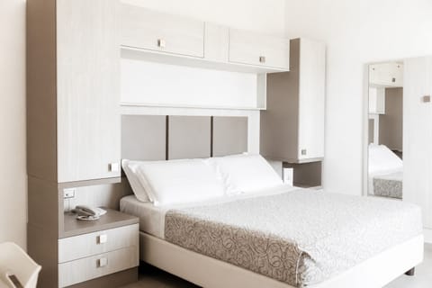 Double or Twin Room, Balcony | In-room safe, desk, WiFi (free), bed sheets