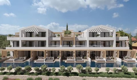 Suite, Balcony, Pool View | Pool | Seasonal outdoor pool