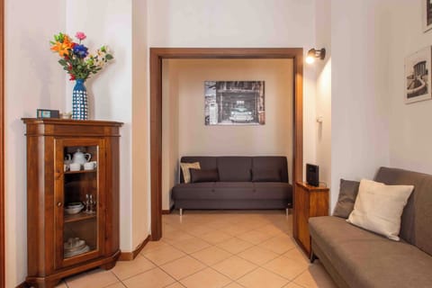Apartment (1 Bedroom) | Living area | 32-inch Smart TV with cable channels