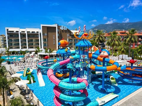 2 outdoor pools, pool umbrellas, sun loungers