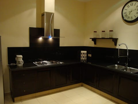 Villa | Private kitchen | Fridge, microwave, stovetop, coffee/tea maker