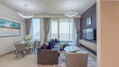 Deluxe Apartment, Balcony, Harbor View | Living area | 55-inch Smart TV with digital channels