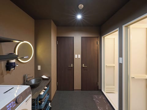 Deluxe Apartment, Balcony, City View | Bathroom | Shower, free toiletries, hair dryer, slippers