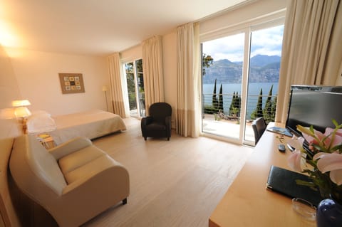 Junior Suite, Balcony, Lake View | Frette Italian sheets, minibar, in-room safe, desk