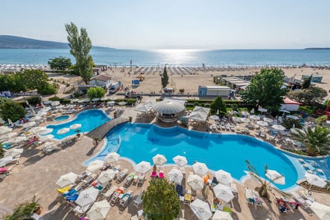 Indoor pool, seasonal outdoor pool, pool umbrellas, sun loungers