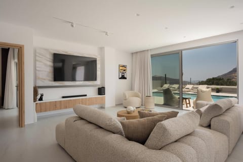 Villa, Mountain View | Living area | 75-inch Smart TV with digital channels, offices