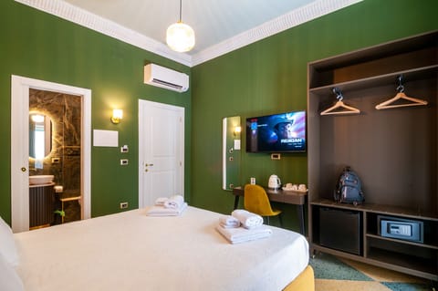 Deluxe Double Room, Balcony, City View | In-room safe, desk, blackout drapes, soundproofing
