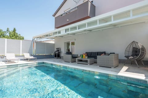 Outdoor pool, sun loungers