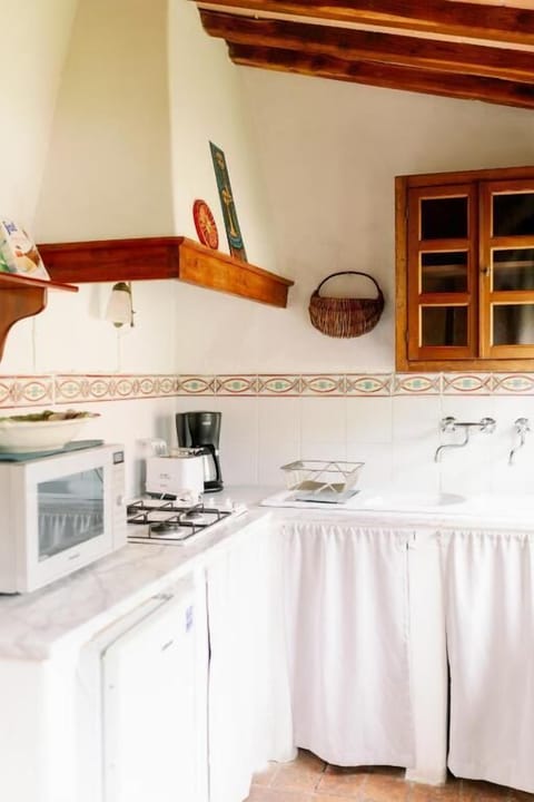 Apartment, Garden View | Private kitchen | Highchair
