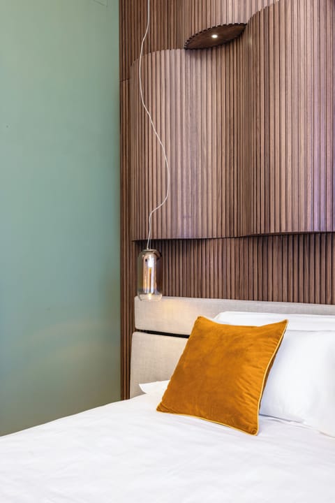 Superior Quadruple Room, Kitchen | Desk, laptop workspace, blackout drapes, soundproofing