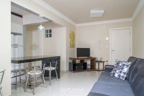 Basic Apartment | Living area | 40-inch TV with digital channels