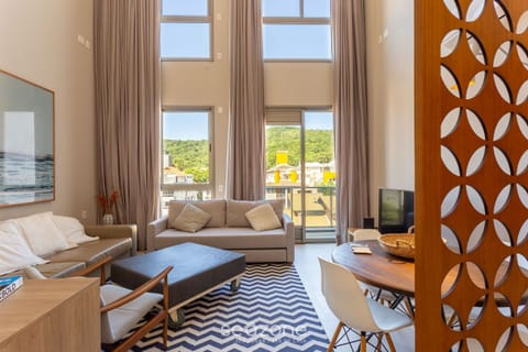 Basic Apartment | Living area | 40-inch TV with digital channels