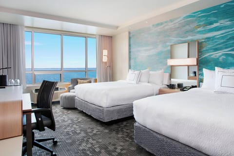Premium bedding, down comforters, desk, laptop workspace