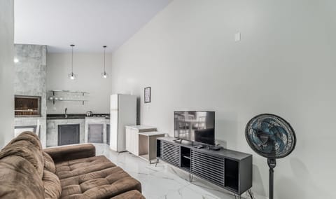 Villa | Living area | 40-inch TV with digital channels