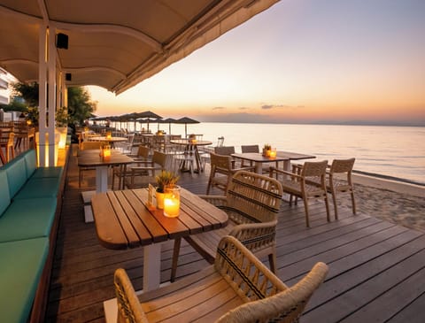 Breakfast, lunch, dinner served; beach views