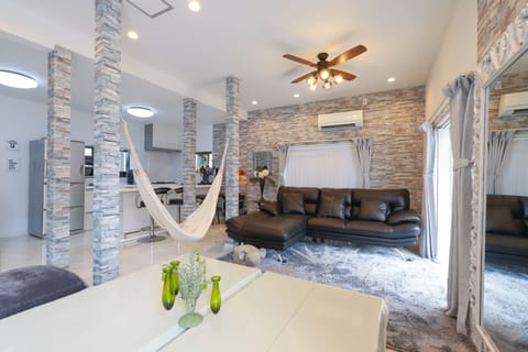 House, 1 Bedroom, Non Smoking, Patio | Living area | 55-inch flat-screen TV with digital channels