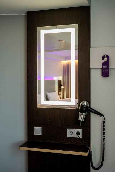 Blackout drapes, iron/ironing board, cribs (free), WiFi
