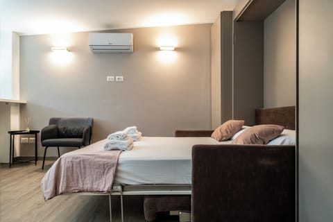 Apartment, City View | Iron/ironing board, WiFi (free)